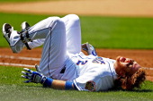 Justin Turner of the New York Mets suffering some back pain after a fall. Justin Turner of the New York Mets suffering some back pain after a fall.