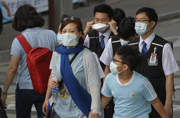 People in South Korea using masks People in South Korea using masks