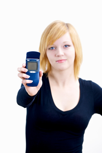 Diabetc Teen Holding Up Blood Sugar Tester