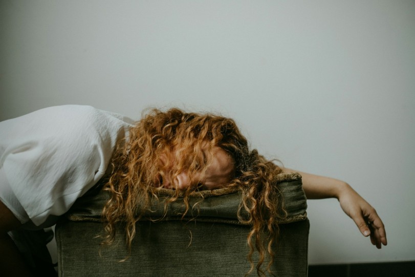 girl fell asleep on couch