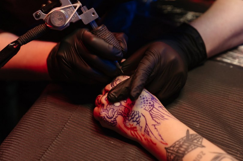 getting inked on the hand