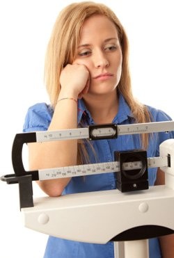 Women have a harder time losing weight because they have different dietary and exercise needs from men. 