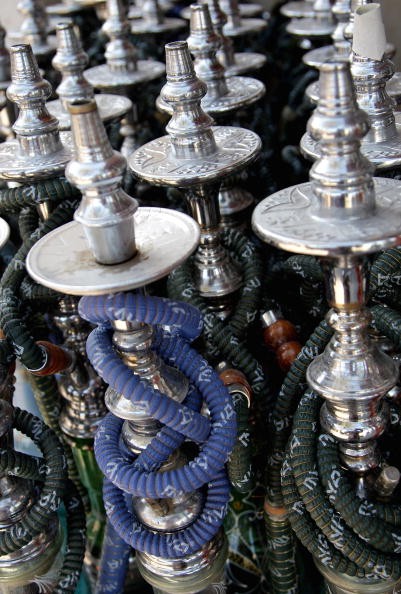 An array of hookahs, the Middle-Eastern water pipes. 