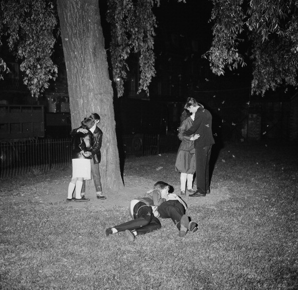 Teens in 1964 kissing in a park. The percentage of teens who say they are sexually active has dropped in a generation. 