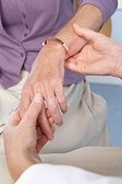 A woman with rheumatoid arthritis in her hands. 