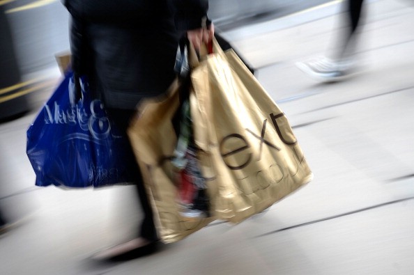 Christmas Shoppers Hunt For Gifts On The High Street