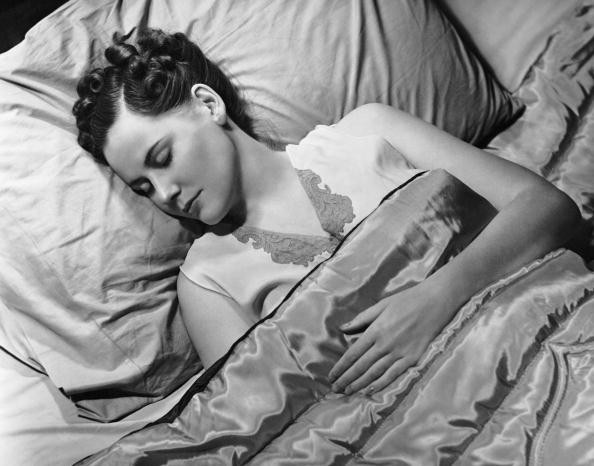Sleeping woman in bed