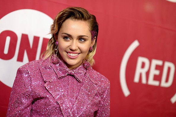 Miley Cyrus at the ONE Campaign and (RED)s concert World AIDS Day event.