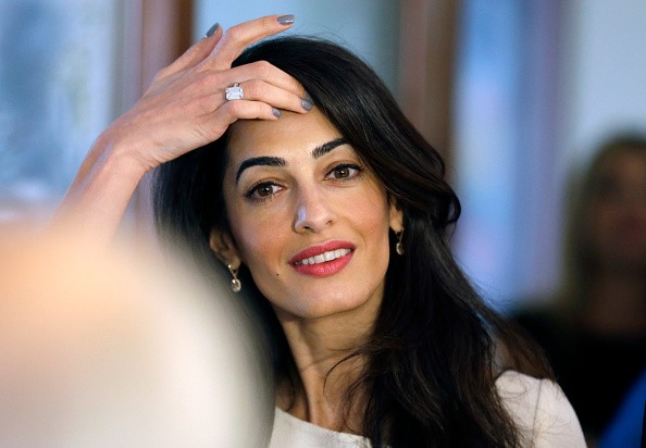 Amal Alamuddin attends a meeting with Greek Culture Minister Kostas Tassoulas in Athens on October 14, 2014 in Athens, Greece