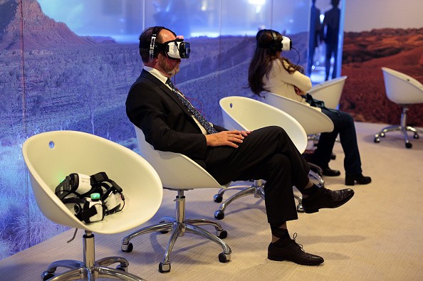 World Economic Forum attendees try out Samsung Gear VR virtual reality headsets