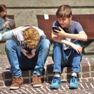 Youth using mobile