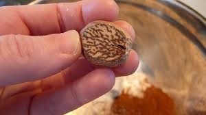 A whole nutmeg seed