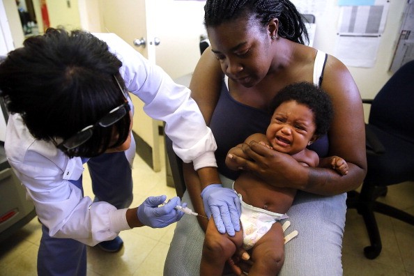 A child receives a vaccination.  
