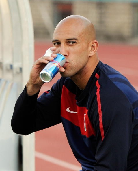 Soccer player Tim Howard drinking a can of Red Bull